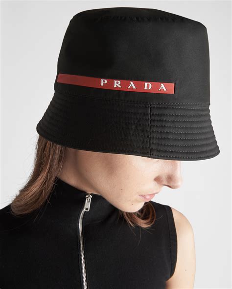 prada black logo cap|Prada bucket hats.